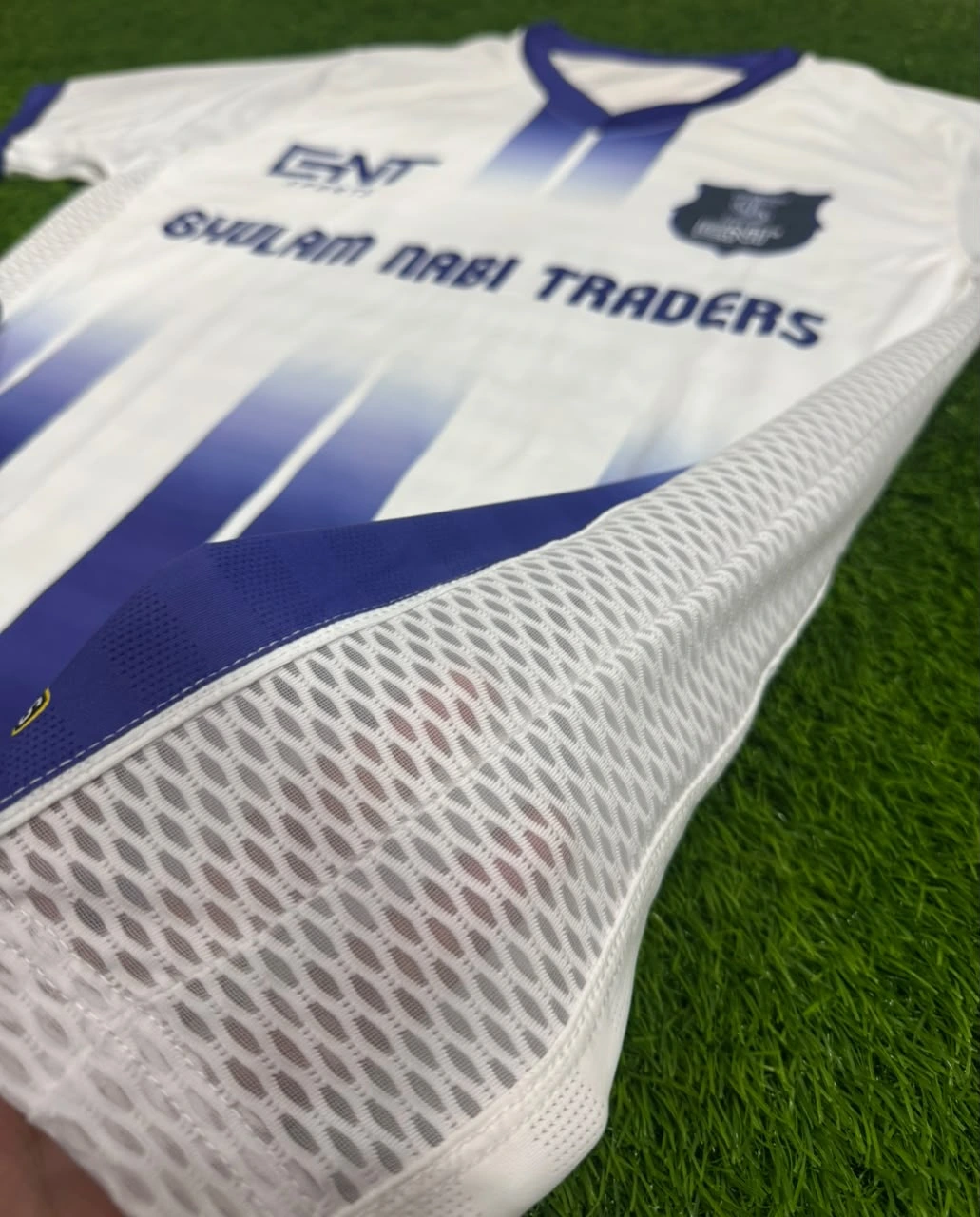GNT Sports sublimated white and blue football jersey for Ghulam Nabi Traders